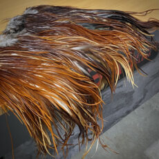 Hareline Dyed Over White Saddle Hackles