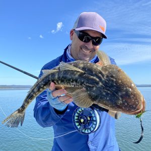 Brett Clarke with a big Flathead on a clouser fly